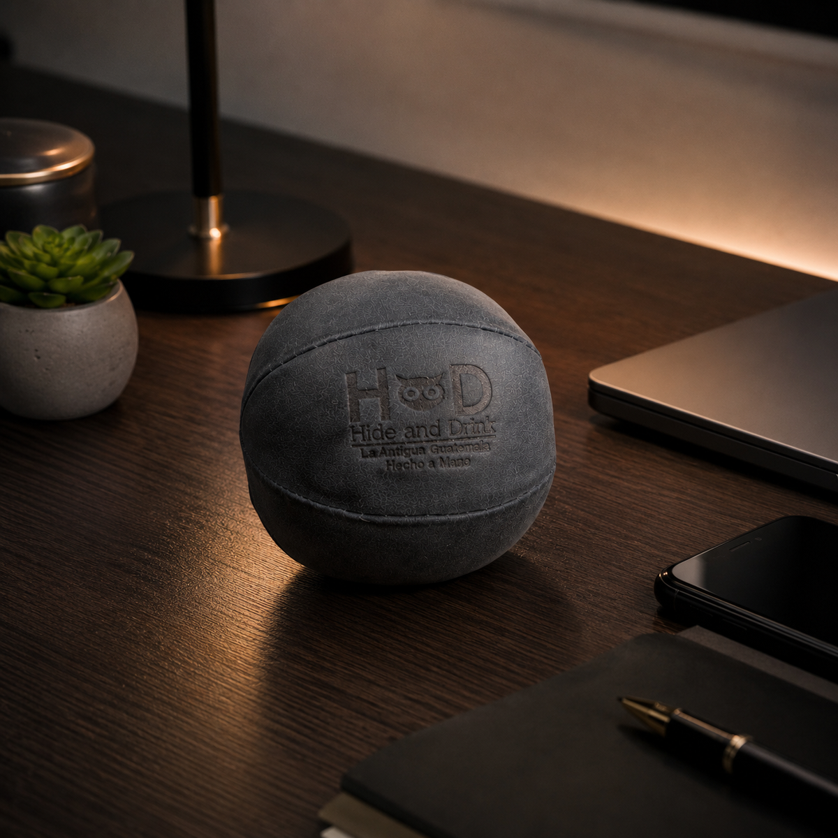 hand-stitched full-grain leather sphere shaped for the palm, designed to release tension, ease stress, and give restless hands something satisfying to do.